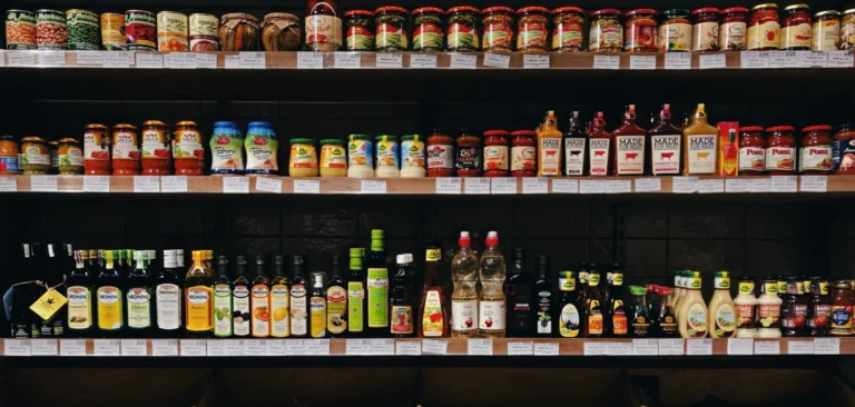 Shelves of liquor behind a bar