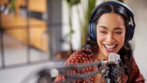 Woman on podcast microphone