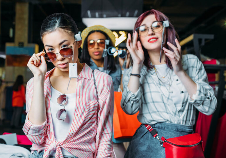 Gen Z friends shopping for sunglasses